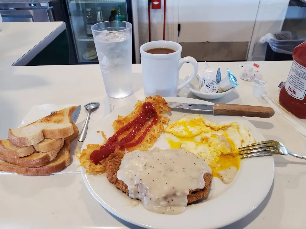 Chicken Fried Steak with Eggs and Country Potatoes
