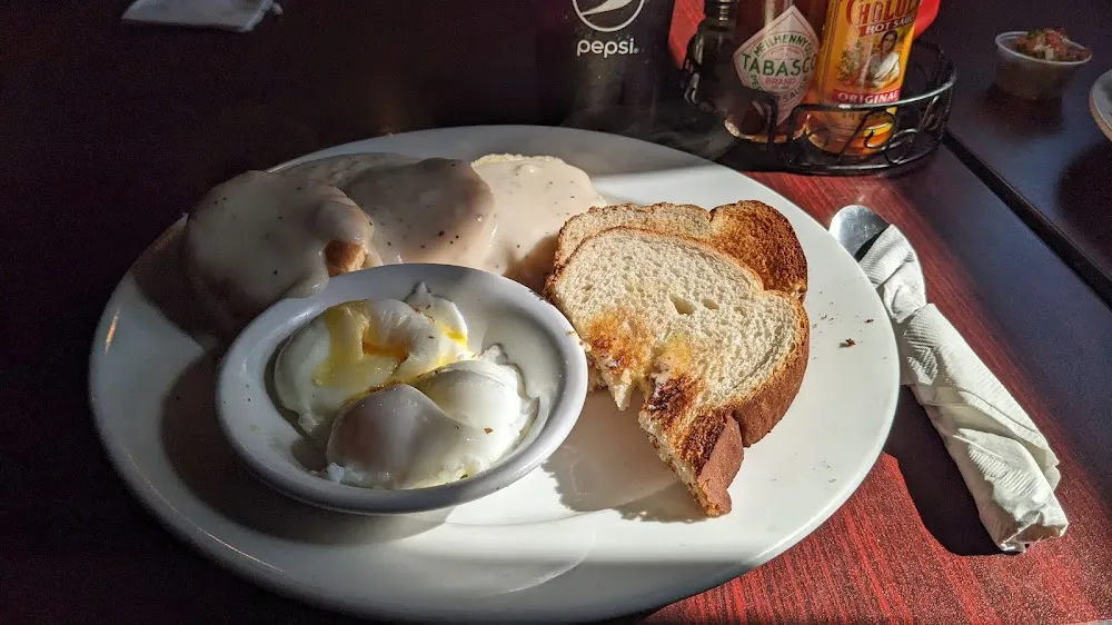 Poached Eggs Biscuits and Gravy with Toast